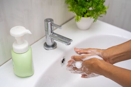 washing hand with hand wash foam,clean