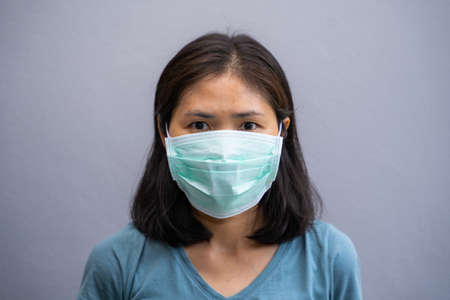 9 April 2020-Phang-nga::woman wearing protection face mask,maskのeditorial素材