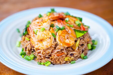 Khao Pad Tom Yum Goong spicy fried rice with shrimp,Thai food の写真素材