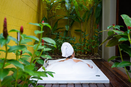 chilling in bathtub at resort,bathtubの写真素材