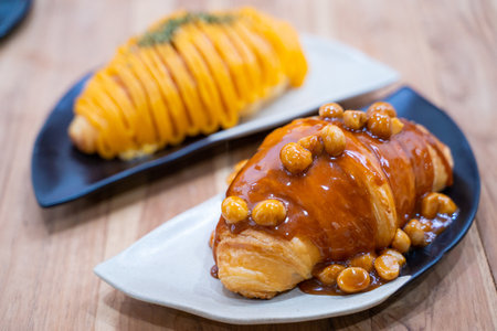 croissant with caramel and macadamia,croissantの写真素材