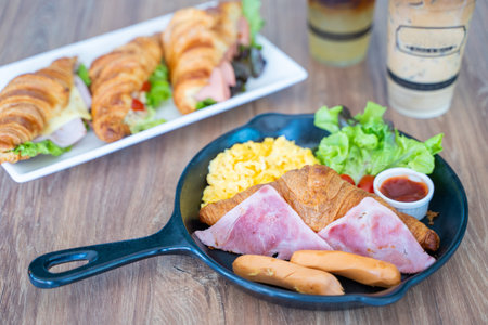 croissant and scrambled eggs for breakfast,croissantの写真素材