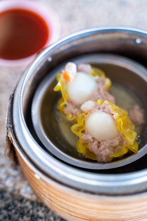 Dim sum in the steam basket, traditional chinese foodの写真素材