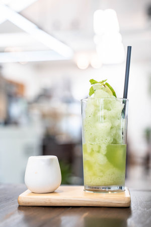 light mango smoothie serve with black tea,smoothieの写真素材