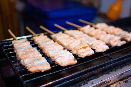 grilled salmon belly sell at night market,grilled salmonの写真素材