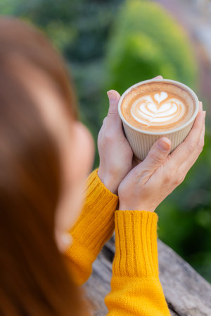 beautiful Latte art coffee with hot milk,coffeeの写真素材