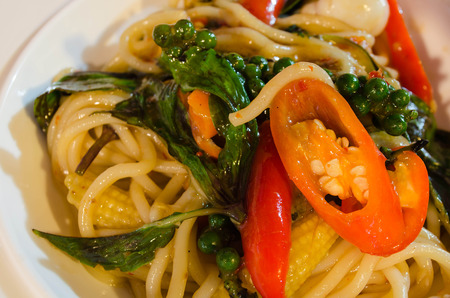 Spaghetti sauce drunken seafood. Hot and spicy in thai food.の写真素材