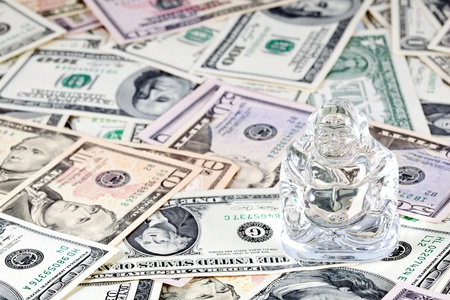Feng Shui. Laughing Buddha against money