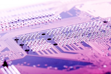 Microchip background - close-up of electronic circuit board with processorの写真素材
