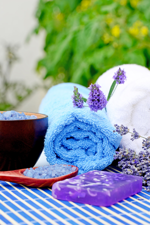 Spa treatments of lavender flowers, lavender soap and lavender sea saltの写真素材