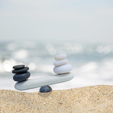 Zen stones balance concept.The balance between black and whiteの写真素材