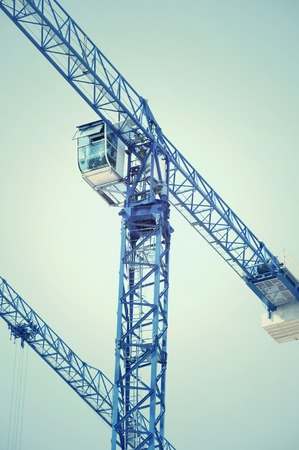 Urban development and construction. Photo toned in vintage styleの写真素材