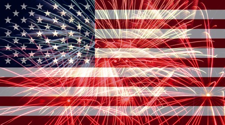 American flag against fireworksの写真素材