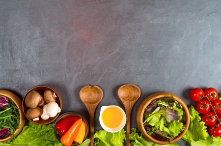 Fresh vegetables for dietary catering on gray background top viewの写真素材