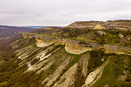 Cave city Bakla, near the city of Bakhchisaray, Crimea. Aerial drone viewのeditorial素材