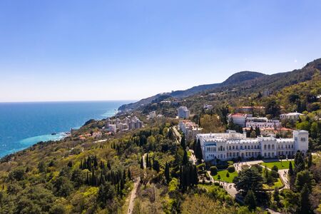 Aerial drone shot of Livadia Palace with a beautiful landscaped garden in Crimea