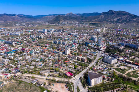 View from a great height to the resort of Sudak on the Black Sea, Crimea. Aerial drone viewの写真素材