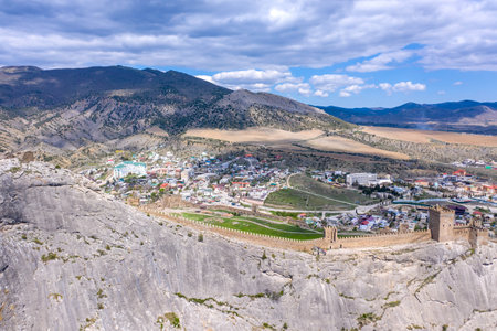 Panoramic aerial shot of Genoese fortress in Sudak at sunriseの写真素材