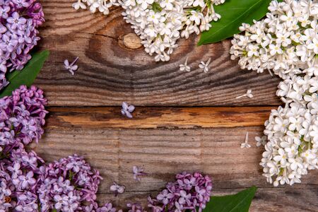 Bouquet of pink and white lilac on a old wooden background. Top viewの写真素材
