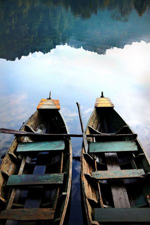 little boats in nature landscape with lakeの写真素材