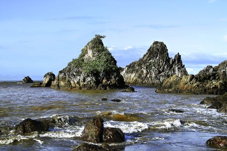 Rock at the edge of the tropical sea coast, north of Java, Indonesia.の写真素材