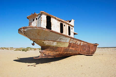 Abandoned ship at ship graveyard in Mo'ynoq Uzbekistanの写真素材