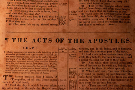 The Holy Bible is an open book of the Christian faith. The text in the old paper.