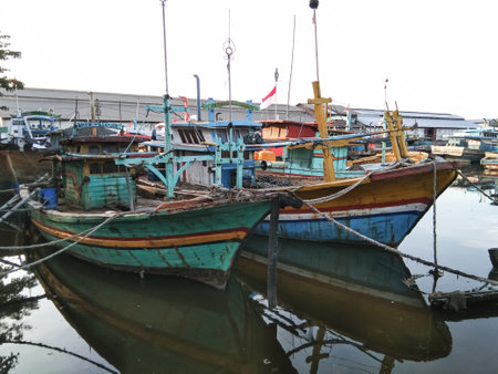 Probolinggo,Indonesia. Nov. 06,2022 - some fishing boats are docked in the fishing portのeditorial素材