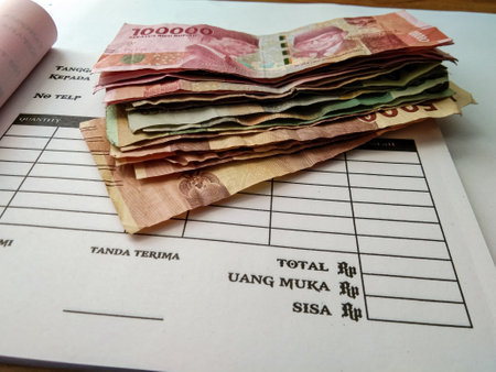 blank notes and rupiah notes on it