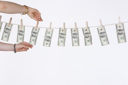 One Hundred dollar bills on a clothesline の写真素材