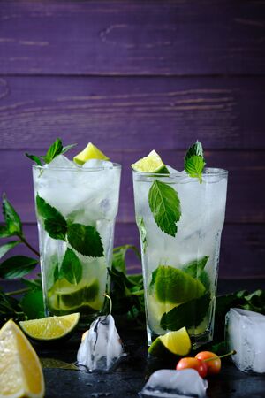 Mojito. Cocktail with rum, lime, sugar syrup, mint and soda. A refreshing summer cocktail.の写真素材