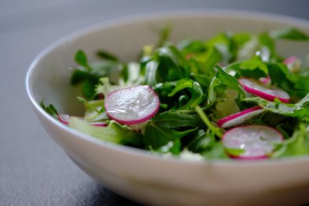 Dietary salad with arugula and radish. Diet. Vegetarian salad.の写真素材