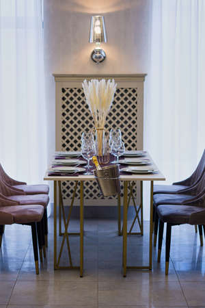 Table setting in the restaurant. Preparing the restaurant for receiving guests.の写真素材