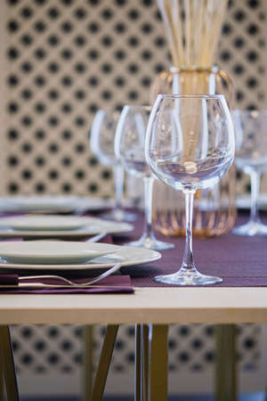 Table setting in the restaurant. Preparing the restaurant for receiving guests.の写真素材