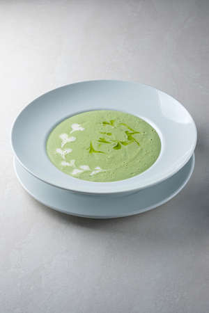 Menu for the restaurant: broccoli cream soup, seasoned with olive oil and cream.の写真素材