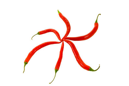 the star from six red chili peppers with clipping pathの写真素材