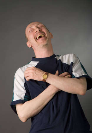 the portrait of senior man on grey background