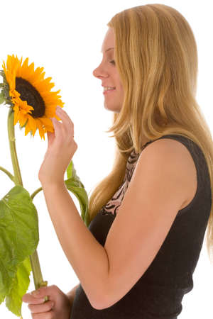 the young woman with sunflower on white backgroundの写真素材