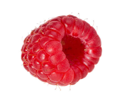 single large raspberry macro isolated on white backgroundの写真素材