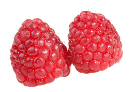 two large raspberry isolated on white background