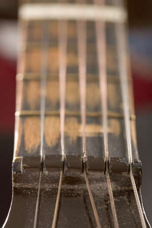 part of old guitar with strings macro