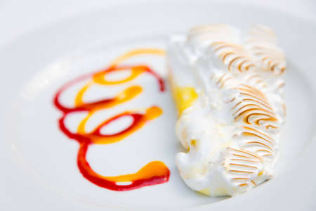 sweet pastry on a white plate macroの写真素材