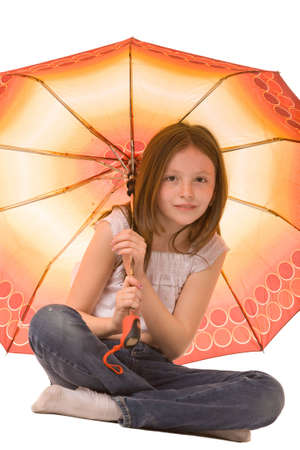 girl with umbrella isolated on a white backgroundの写真素材