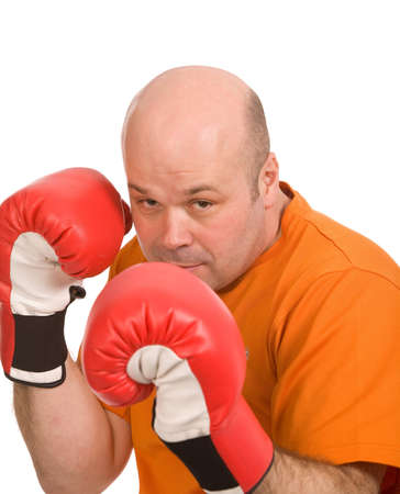 man with red boxing gloves on a white backgroundの写真素材