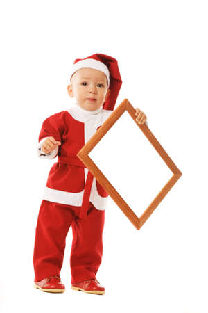 the small boy in christmas dress with frame on white backgroundの写真素材
