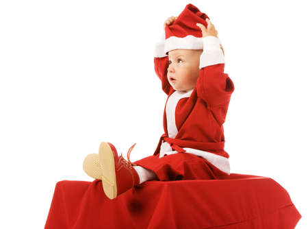 the small boy in christmas dress on white backgroundの写真素材