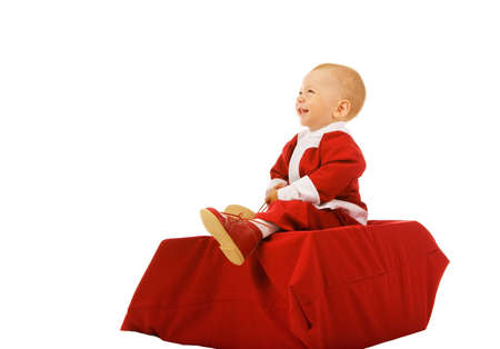 the small boy in christmas dress on white backgroundの写真素材