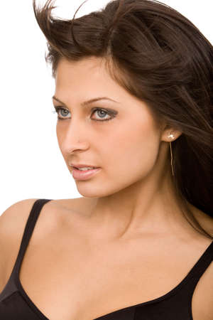 portrait of a young brunette woman on white backgroundの写真素材