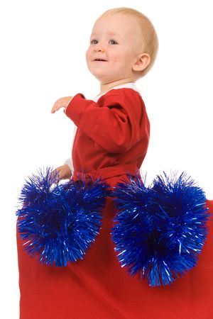 little boy dressed as Santa Claus on a white backgroundの写真素材