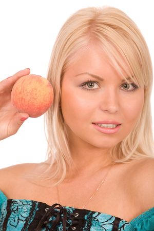 young blond woman with the ripe peach isolated on whiteの写真素材